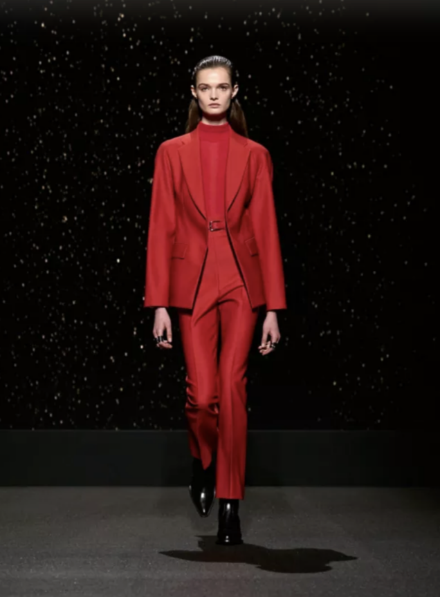 model walking down the runway at Hermès FW24 in red suit