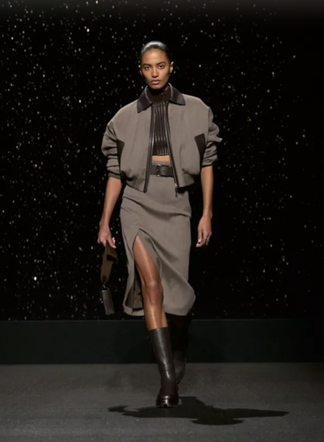 model walking down the runway at Hermès FW24 in khaki look